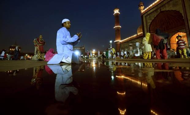 A man pray before break his fast on the first Iftar of the holy month of Ramadan at Jama Masjid in New Delhi (Photo: AP) A man pray before break his fast on the first Iftar of the holy month of Ramadan at Jama Masjid in New Delhi (Photo: AP)